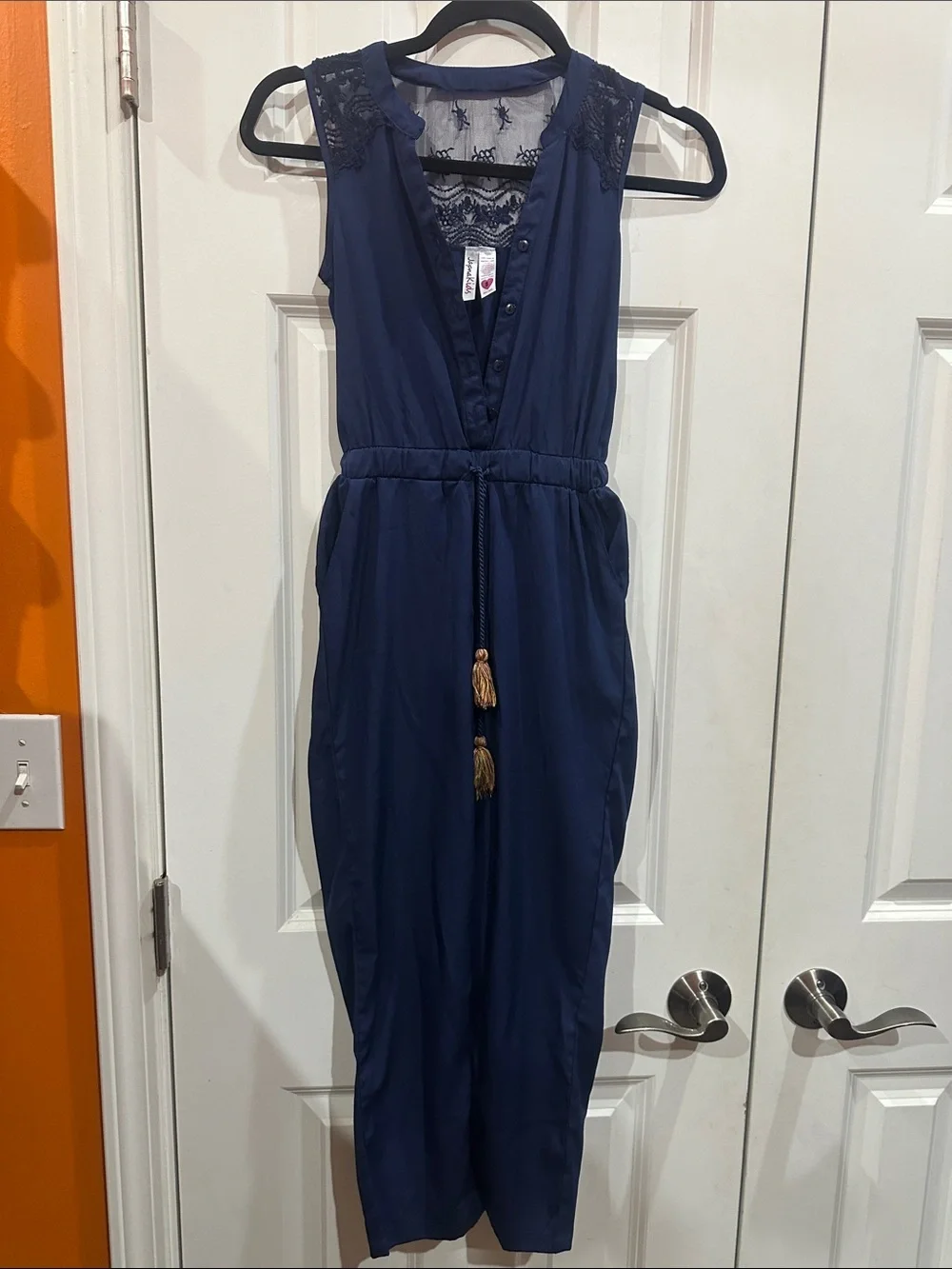 NWOT Kids Navy Sleeveless Lace Yoke Jumpsuit with Tassel Belt size 8
